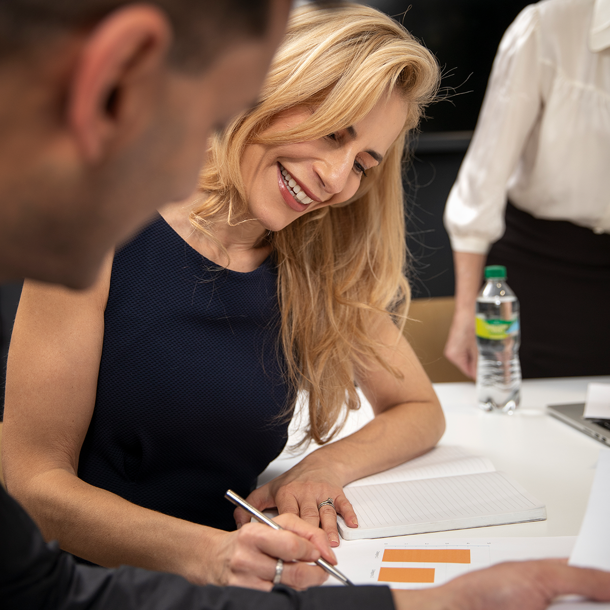 smiley-business-team-working-together smiley-business-team-working-together