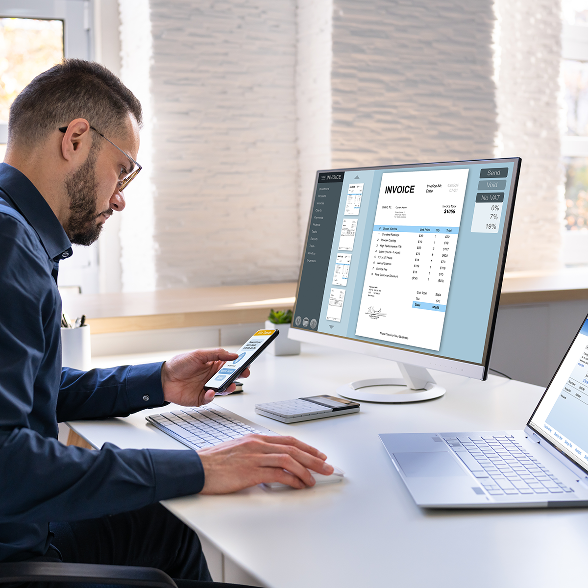 young-businessman-looking-invoice-while-doing-online-banking young-businessman-looking-invoice-while-doing-online-banking